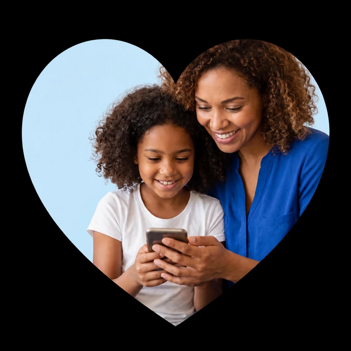 A mother and daughter looking at a phone together