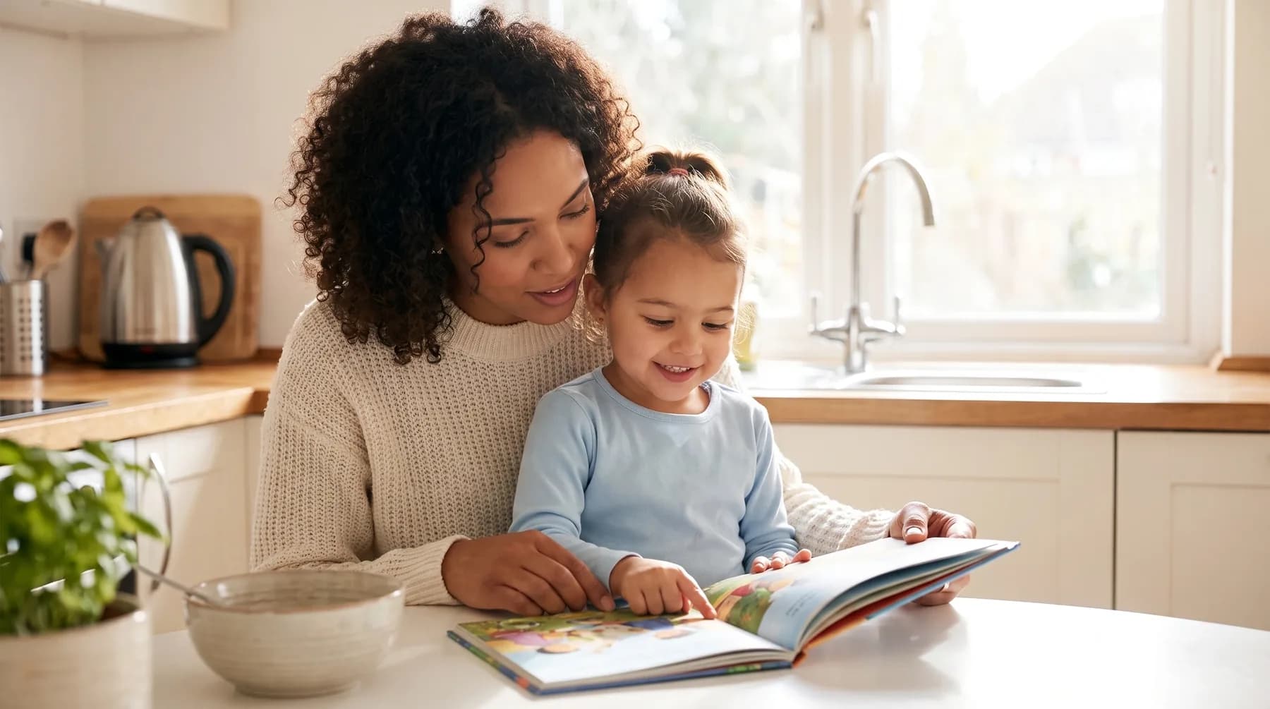 A mother and daughter reading a book together